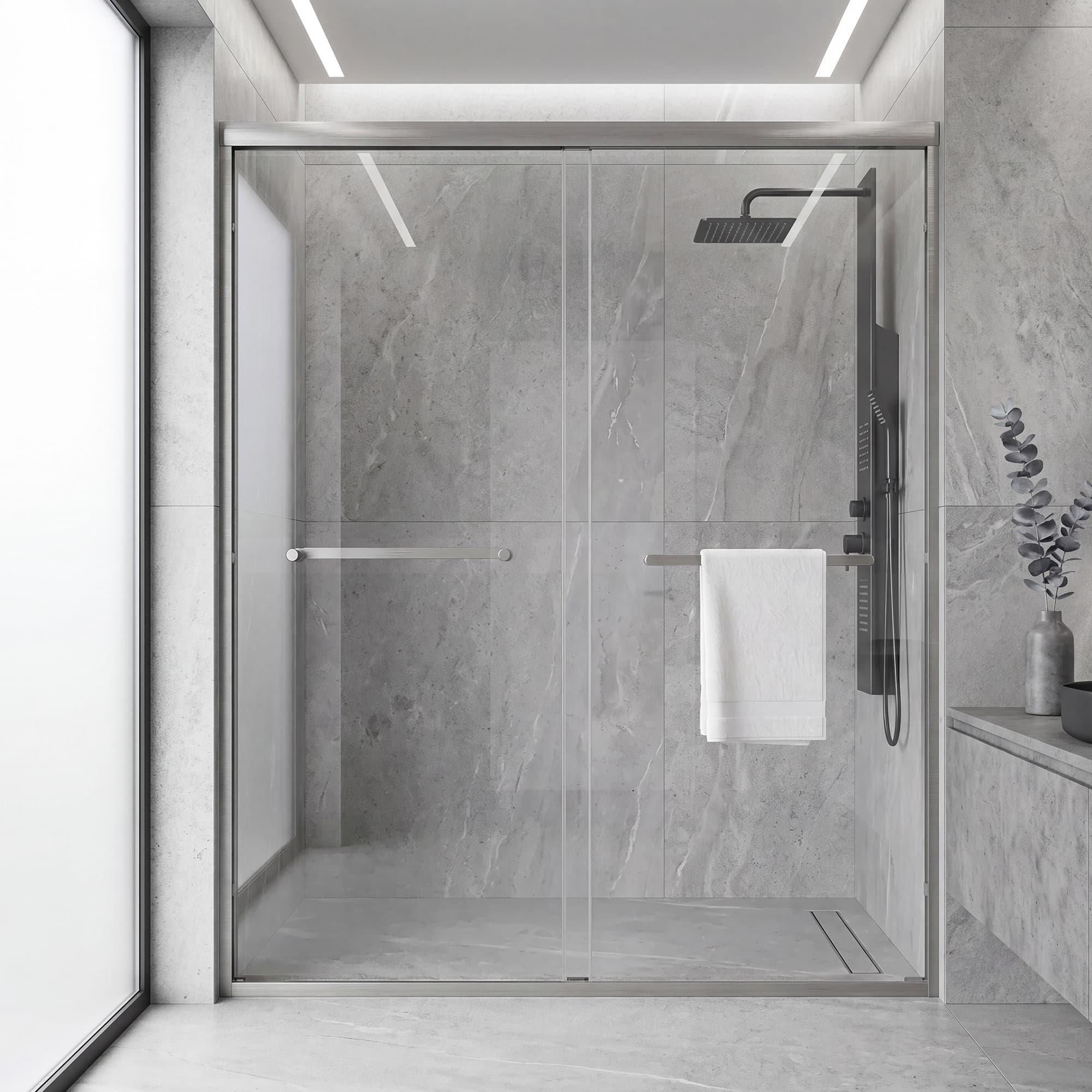 Core brushed nickel framed double sliding shower door in a tiled bathroom
