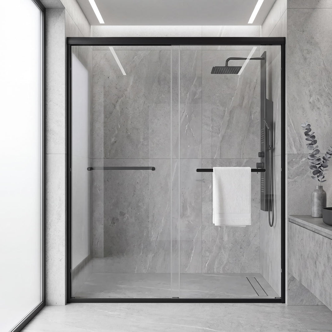 Core matte black framed double sliding shower door in a tiled bathroom