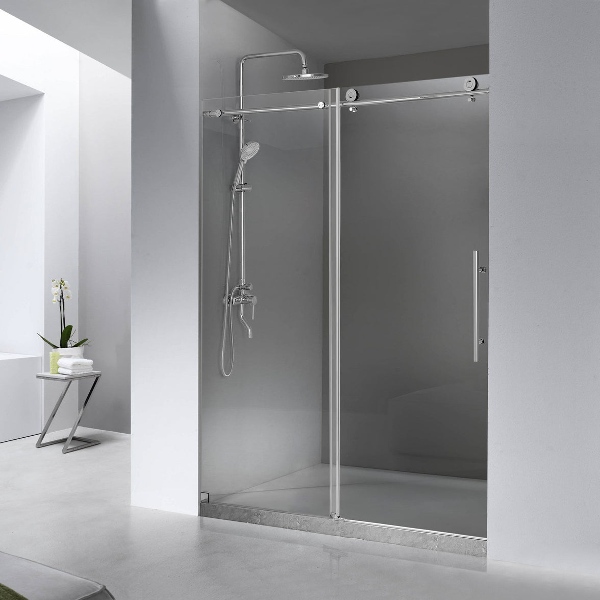 Jade brushed nickel frameless single sliding shower door installed in a modern bathroom