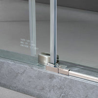 Bottom guide detail on Jade brushed nickel frameless sliding shower door