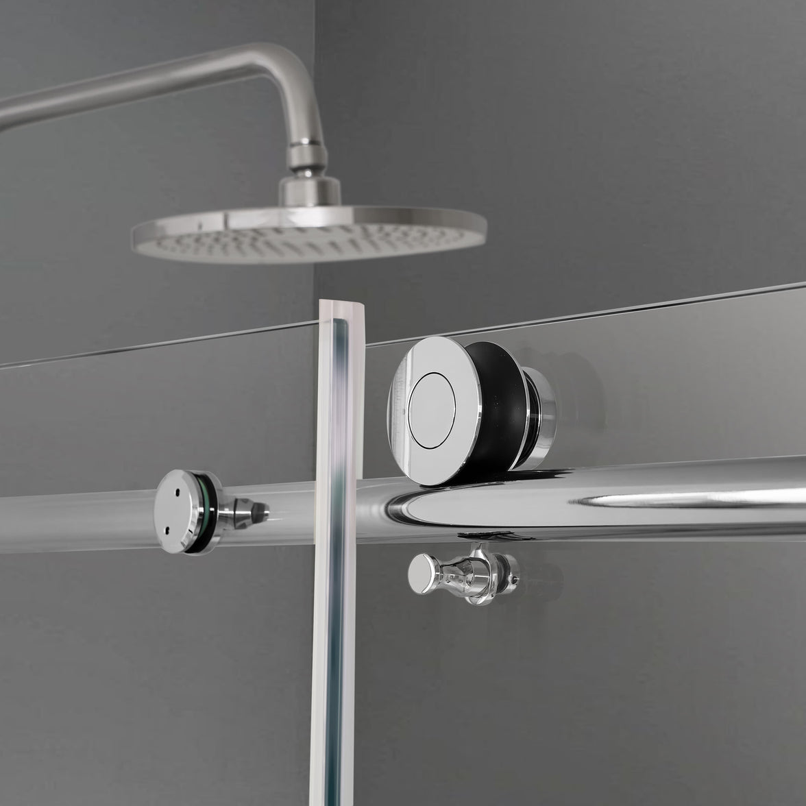 Stainless steel sliding roller detail on Jade brushed nickel frameless shower door