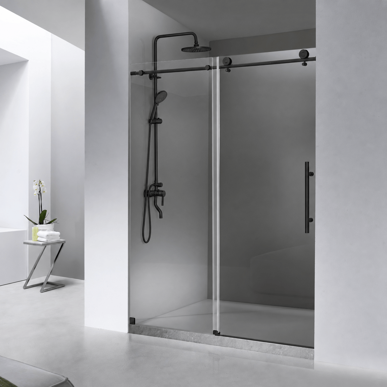 Jade matte black frameless single sliding shower door installed in a modern bathroom