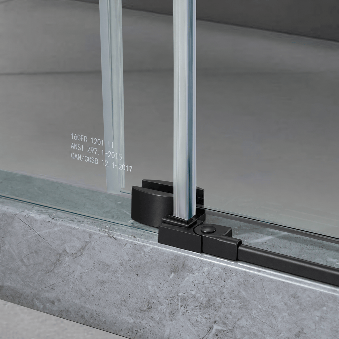 Bottom guide detail on Jade matte black frameless sliding shower door