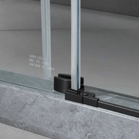 Bottom guide detail on Jade matte black frameless sliding shower door