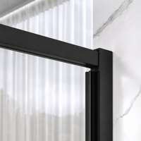 Stainless steel sliding roller detail on Jade matte black semi-frameless shower door