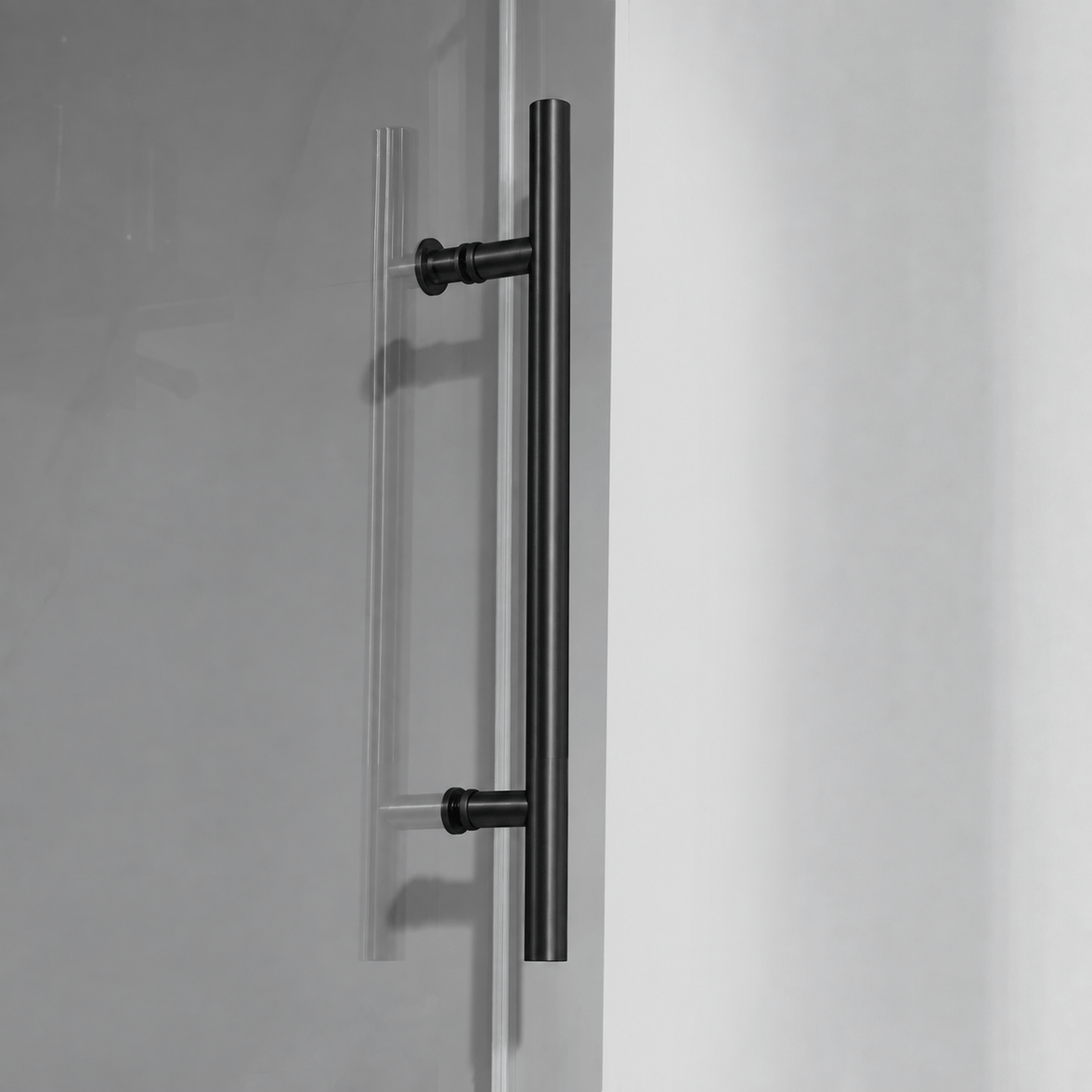 Stainless steel towel bar detail on Jade matte black shower door