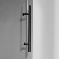 Stainless steel towel bar detail on Jade matte black shower door