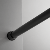Wall-mounted stainless steel top track on Jade matte black sliding shower door